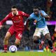 Liverpool's Trent Alexander-Arnold (left) battle for the ball with Manchester City's Jeremy Doku during the Premier League match at the Etihad Stadium, Manchester. Picture date: Sunday February 23, 2025.