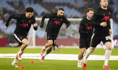 Liverpool's Mohamed Salah (centre) warms up ahead of the Premier League match at Villa Park, Birmingham. Picture date: Wednesday February 19, 2025.