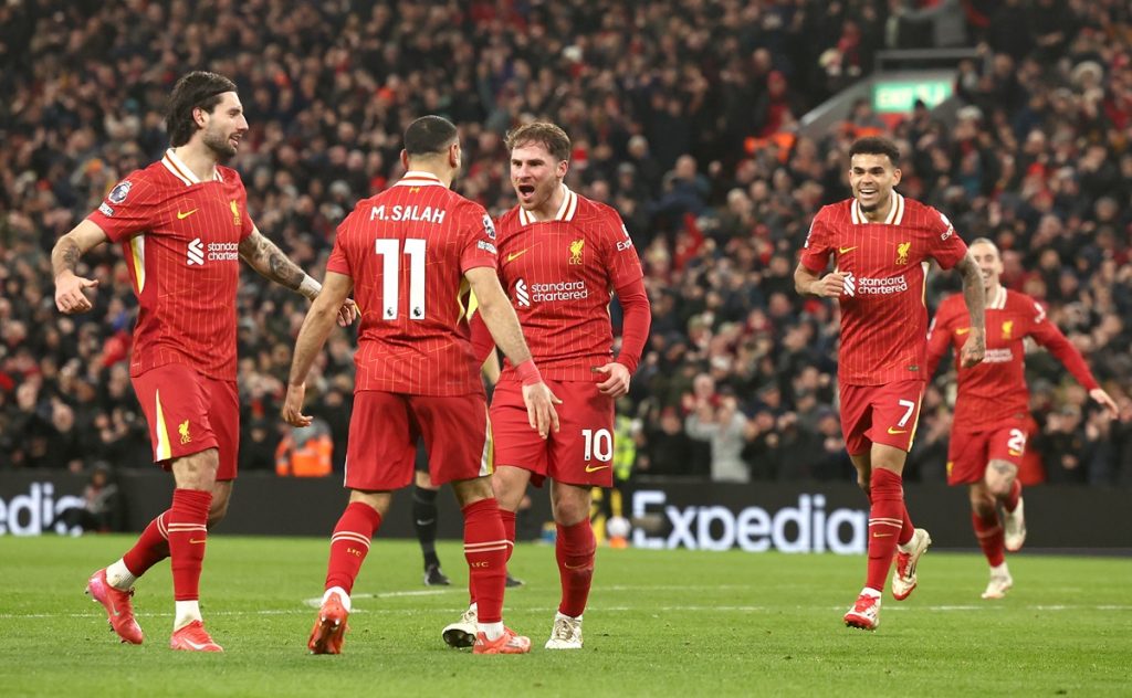 epa11926780 Alexis Mac Allister (C) of Liverpool celebrates with teammates after scoring his team's second goal during the English Premier League match between Liverpool FC and Newcastle United, in Liverpool, Britain, 26 February 2025. EPA/ADAM VAUGHAN EDITORIAL USE ONLY. No use with unauthorized audio, video, data, fixture lists, club/league logos, 'live' services or NFTs. Online in-match use limited to 120 images, no video emulation. No use in betting, games or single club/league/player publications.