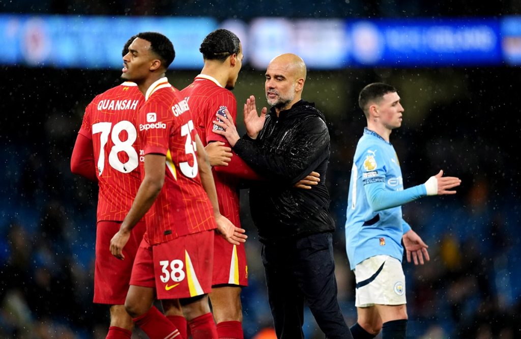 Manchester City manager Pep Guardiola (centre) with Liverpool's Virgil van Dijk after the end of the match following the Premier League match at the Etihad Stadium, Manchester. Picture date: Sunday February 23, 2025.