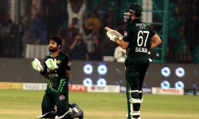 epa11891318 Mohammad Rizwan (L) of Pakistan celebrate a handrad runs during the 3rd one day international (ODI) cricket match against Pakistan at the National Stadium in Karachi, Pakistan, 12 February 2025. EPA/REHAN KHAN