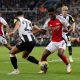 epa11877781 Thomas Partey (C) of Arsenal in action against Jacob Murphy of Newcastle during the EFL Cup semi-final 2nd leg match between Newcastle United and Arsenal FC, in Newcastle, Britain, 05 February 2025. EPA/ADAM VAUGHAN