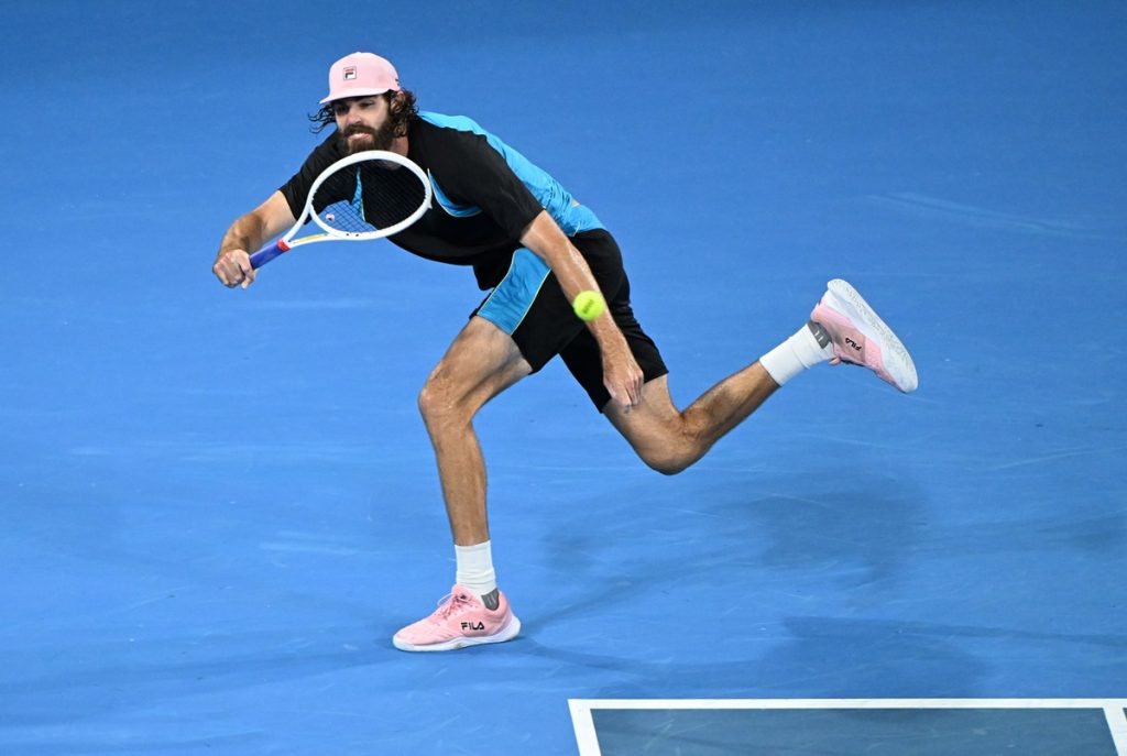 epa11803620 Reilly Opelka of USA in action during his quarter-finals match against Novak Djokovic of Serbia at the Brisbane International tennis tournament in Brisbane, Australia, 03 January 2025. EPA/DARREN ENGLAND AUSTRALIA AND NEW ZEALAND OUT