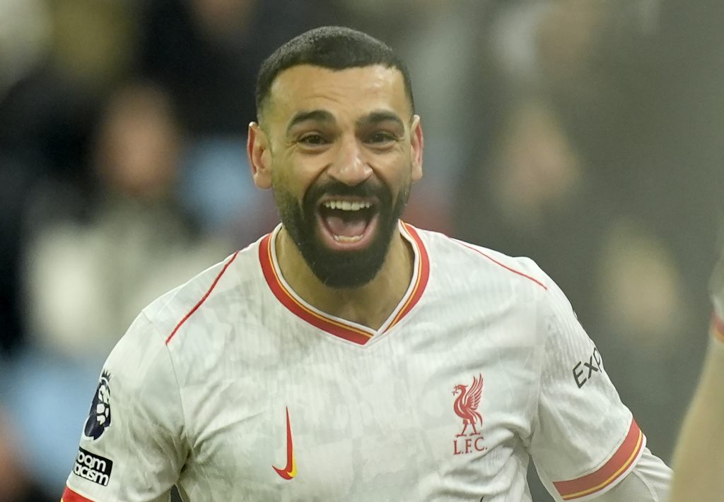 epa11908396 Mohamed Salah of Liverpool celebrates after scoring the opening goal during the English Premier League match between Aston Villa and Liverpool FC, in Birmingham, Britain, 19 February 2025. EPA/TIM KEETON EDITORIAL USE ONLY. No use with unauthorized audio, video, data, fixture lists, club/league logos, 'live' services or NFTs. Online in-match use limited to 120 images, no video emulation. No use in betting, games or single club/league/player publications.