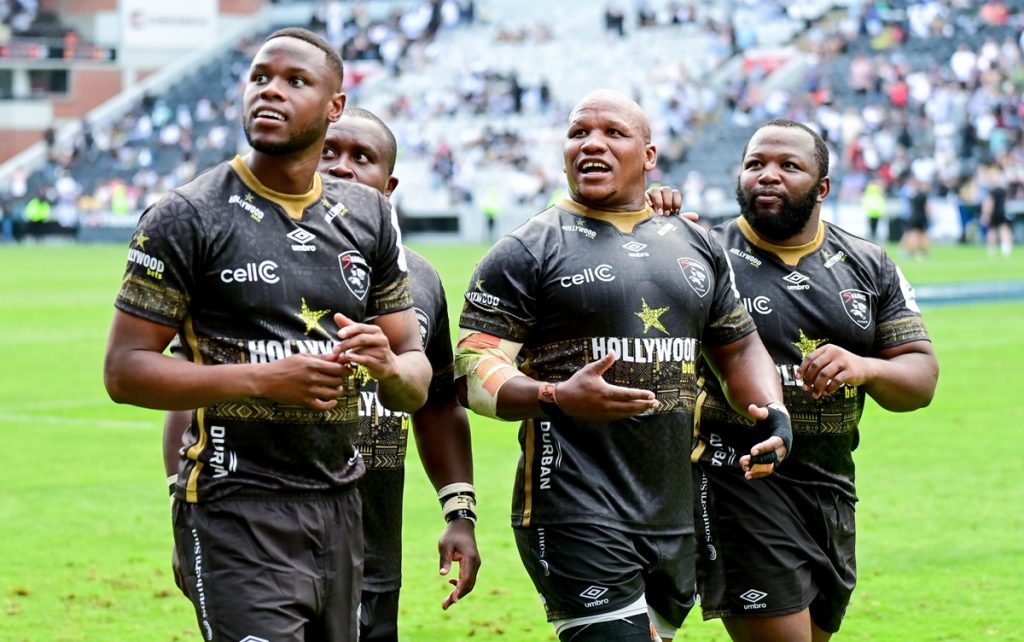 Aphelele Fassi of Hollywoodbets Sharks (L), Trevor Nyakane of Hollywoodbets Sharks (behind), Bongi Mbonambi of Hollywoodbets Sharks (2nd from R) and Ox Nche of Hollywoodbets Sharks (R) during the Champions Cup 2024/25 rugby game between the Sharks and Exeter Chiefs at Kings Park in Durban on 7 December 2024 © Gerhard Duraan/BackpagePix