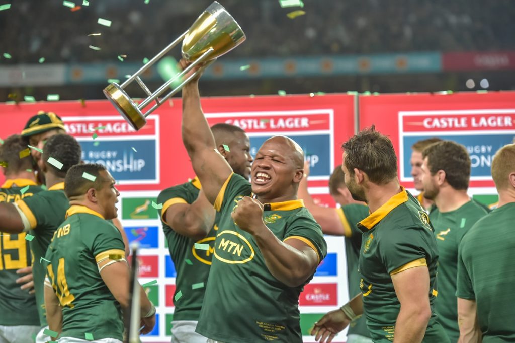 Triumphant Springboks receive the trophy with Bongi Mbonambi of South Africa and Cobus Reinach of South Africa during the 2024 Rugby Championship game between South Africa and Argentina at Mbombela Stadium on 28 September 2024 © Christiaan Kotze/BackpagePix