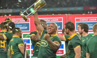 Triumphant Springboks receive the trophy with Bongi Mbonambi of South Africa and Cobus Reinach of South Africa during the 2024 Rugby Championship game between South Africa and Argentina at Mbombela Stadium on 28 September 2024 © Christiaan Kotze/BackpagePix