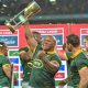 Triumphant Springboks receive the trophy with Bongi Mbonambi of South Africa and Cobus Reinach of South Africa during the 2024 Rugby Championship game between South Africa and Argentina at Mbombela Stadium on 28 September 2024 © Christiaan Kotze/BackpagePix