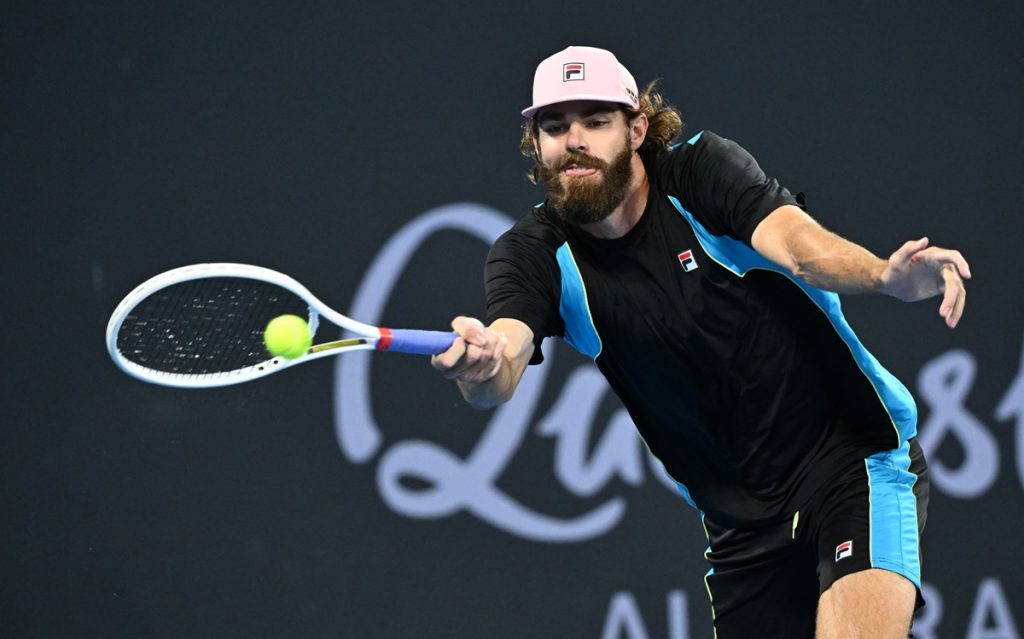 epa11803475 Reilly Opelka of USA in action during his quarter-finals match against Novak Djokovic of Serbia at the Brisbane International tennis tournament in Brisbane, Australia, 03 January 2025. EPA/DARREN ENGLAND AUSTRALIA AND NEW ZEALAND OUT