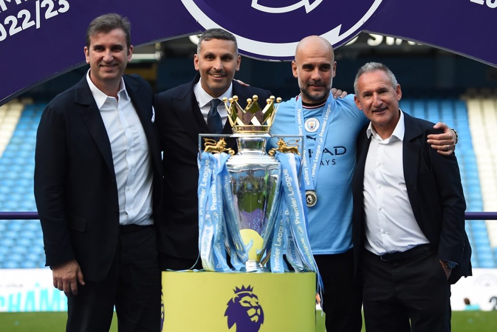 epa10644845 (L-R) Manchester City CEO Ferran Soriano, Manchester City chairman Khaldoon Al Mubarak, Manchester City manager Pep Guardiola and Manchester City director of football Txiki Begiristain pose with the English Premier League trophy after the English Premier League match between Manchester City and Chelsea FC in Manchester, Britain, 21 May 2023. EPA/PETER POWELL EDITORIAL USE ONLY. No use with unauthorized audio, video, data, fixture lists, club/league logos or 'live' services. Online in-match use limited to 120 images, no video emulation. No use in betting, games or single club/league/player publications.