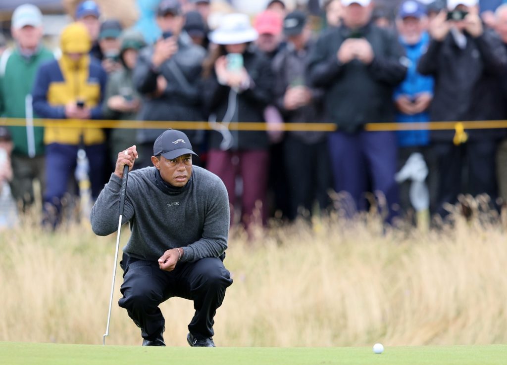 epa11485991 US golfer Tiger Woods in action during Round 1 of the Open Golf Championships 2024 at the Royal Troon Golf Club, Troon, Britain, 18 July 2024. EPA/ROBERT PERRY