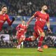 Liverpool's Mohamed Salah (right) celebrates scoring their side's second goal of the game with team-mates during the Premier League match at Goodison Park, Liverpool. Picture date: Wednesday February 12, 2025.