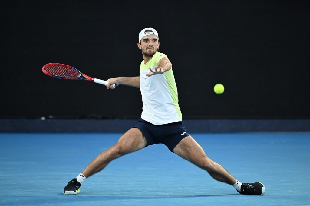 epa11830288 Tomas Machac of Czechia in action during the Men's Singles round 3 match against Novak Djokovic of Serbia at the Australian Open Grand Slam tennis tournament in Melbourne, Australia, 17 January 2025. EPA/JAMES ROSS AUSTRALIA AND NEW ZEALAND OUT