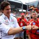 epa11447516 Mercedes team principal Toto Wolff is being congratulated after their driver George Russell of Britain won the Formula One Austrian Grand Prix, in Spielberg, Austria, 30 June 2024. Person 2nd R is unidentified staff of Mercedes team. EPA/MARTIN DIVISEK