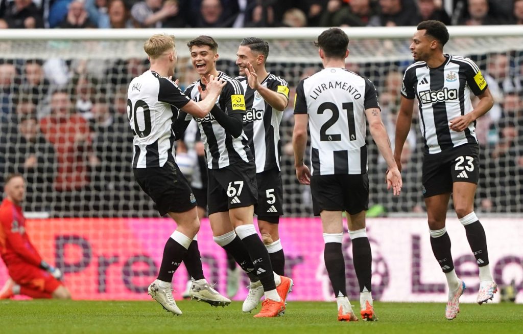 Newcastle United's Lewis Miley (second left) celebrates scoring their side's first goal of the game during the Premier League match at St James' Park, Newcastle upon Tyne. Picture date: Sunday February 23, 2025.