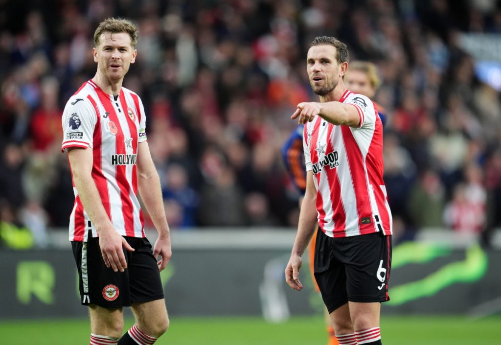 Jordan Henderson and Nathan Collins of Brentford