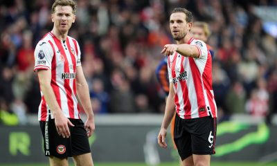 Jordan Henderson and Nathan Collins of Brentford